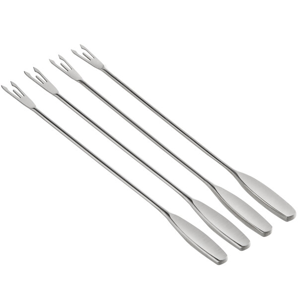 A set of four silver stainless steel Boska fondue forks.