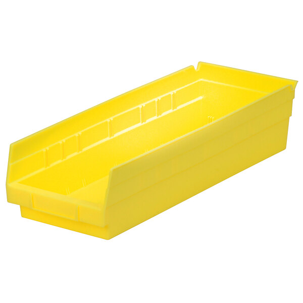 A yellow plastic Metro Nesting Shelf Bin.