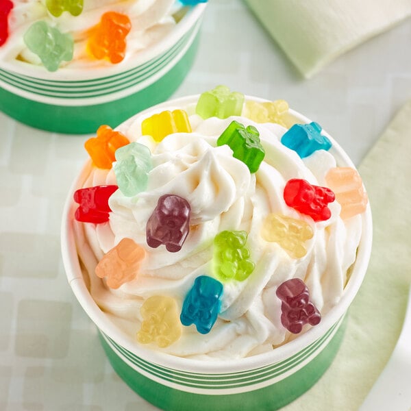 A cup of ice cream with Albanese Mini Gummi Bears on top.