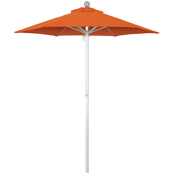 A California Umbrella round orange umbrella with a white pole.