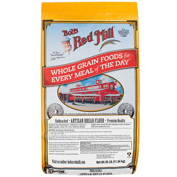 A yellow and white bag of Bob's Red Mill Unbleached Artisan Bread Flour with a red building on the package.