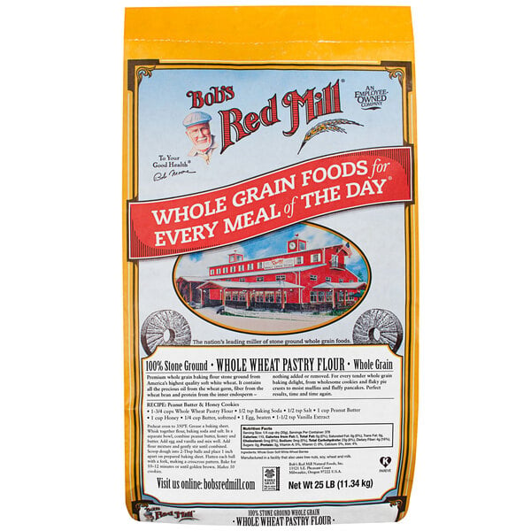 A yellow and white bag of Bob's Red Mill Whole Wheat Pastry Flour with a red building on the package.