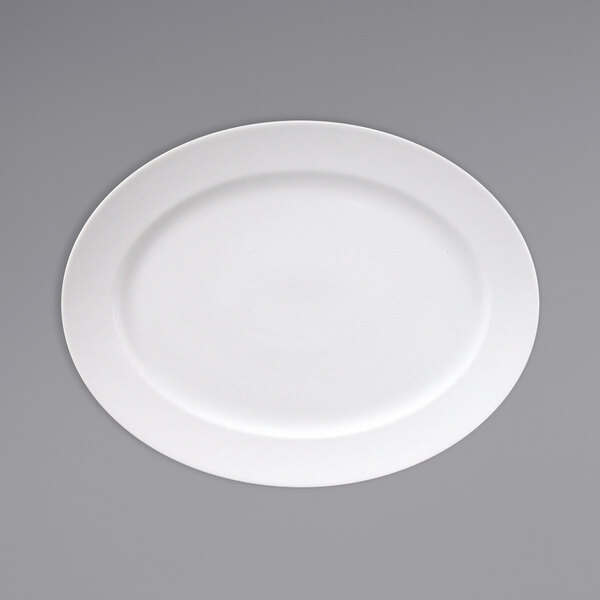 A Fortessa Ilona white china platter with a wide rim.