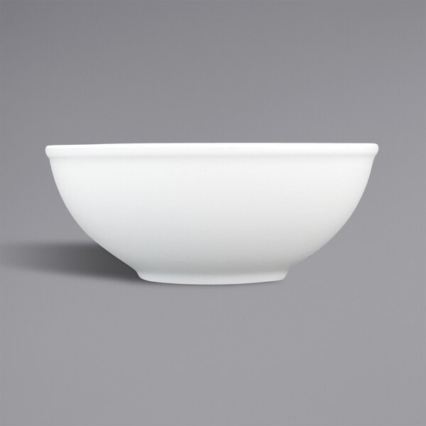 A close up of a Fortessa Ilona bright white china bowl.