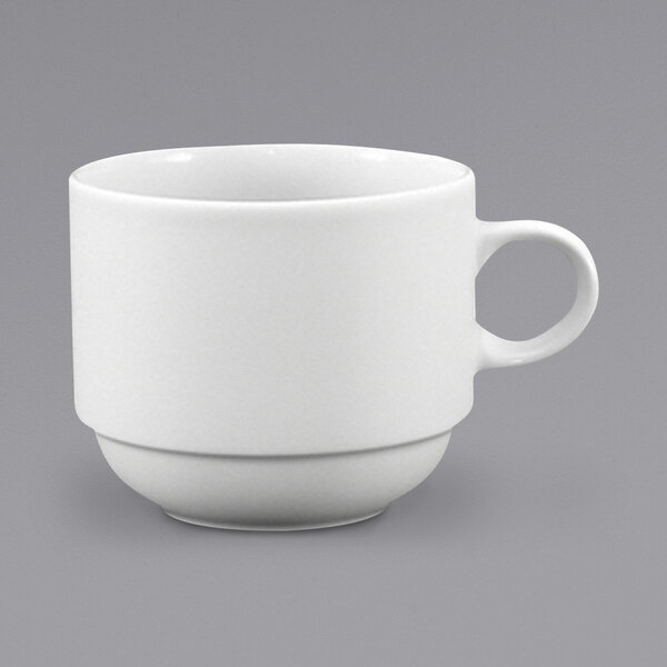 A close-up of a Fortessa Ilona bright white stackable china cup with a handle.