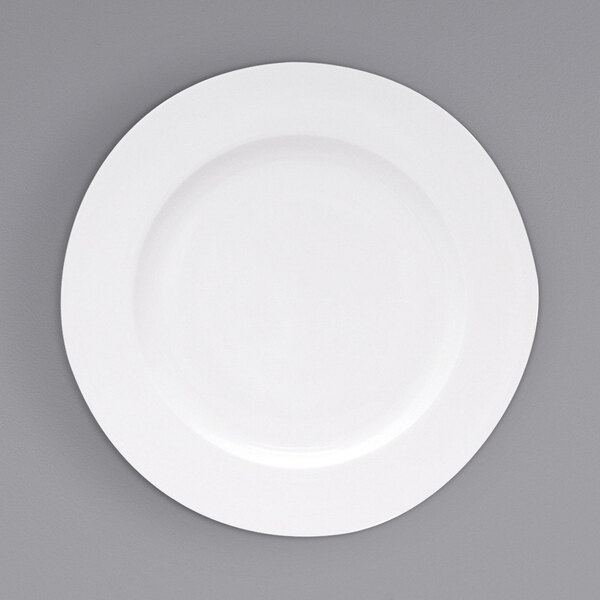 A Fortessa Ilona china plate with a wide white rim.