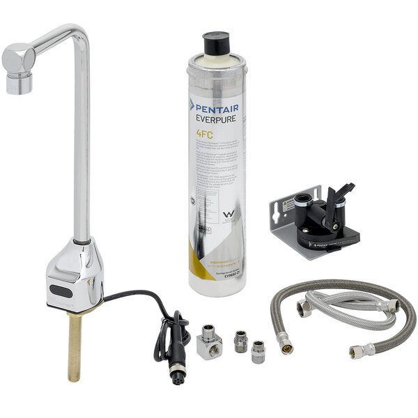 A T&S deck mount glass filler faucet with hoses and a white water filter cartridge.