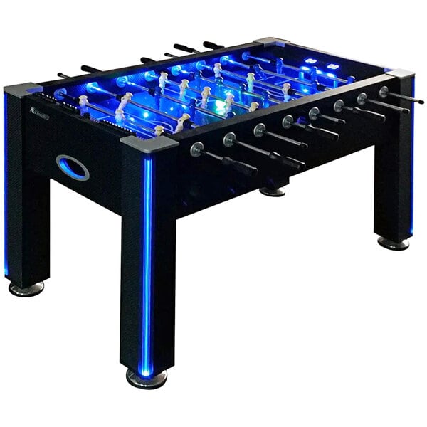 An Atomic foosball table with blue LED lights.