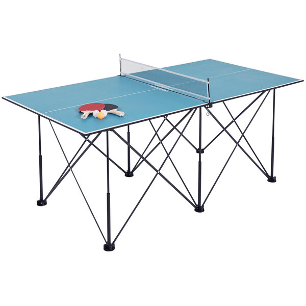 A Stiga Compact 6' pop-up ping pong table with paddles and balls on it.