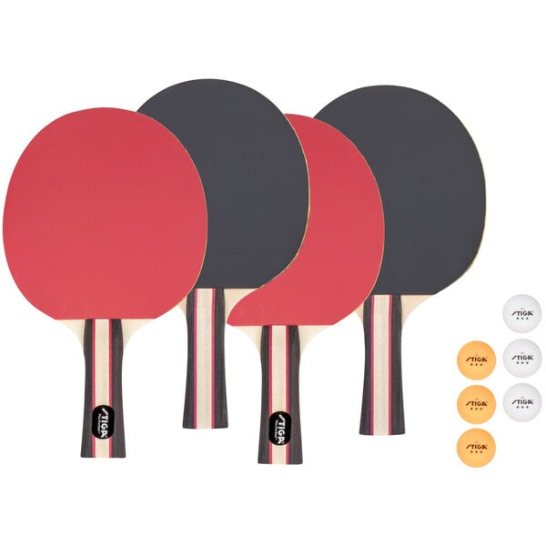 A Stiga ping pong paddle set with three paddles and balls.