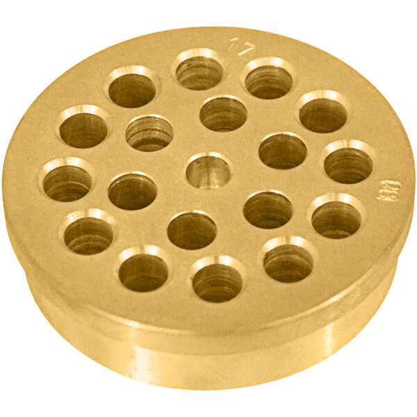 A brass circular object with holes in it.