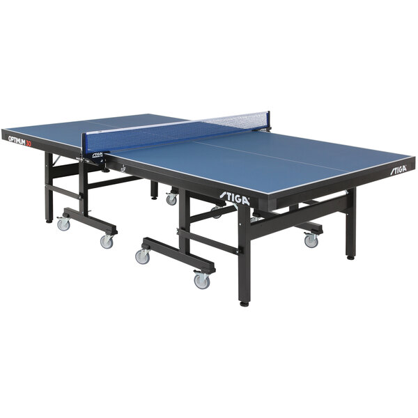 A Stiga Optimum 30 ping pong table with blue top and black legs on wheels.