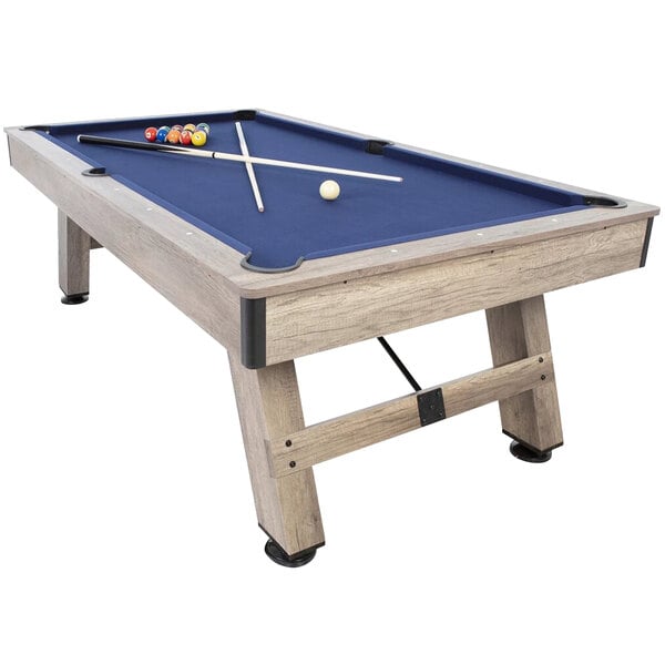 An American Legend Brookdale pool table with blue felt and pool balls on it.