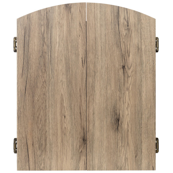 A wooden Dublin dartboard cabinet door with metal hinges.