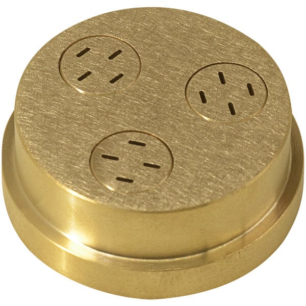 A gold circular brass knob with four holes.