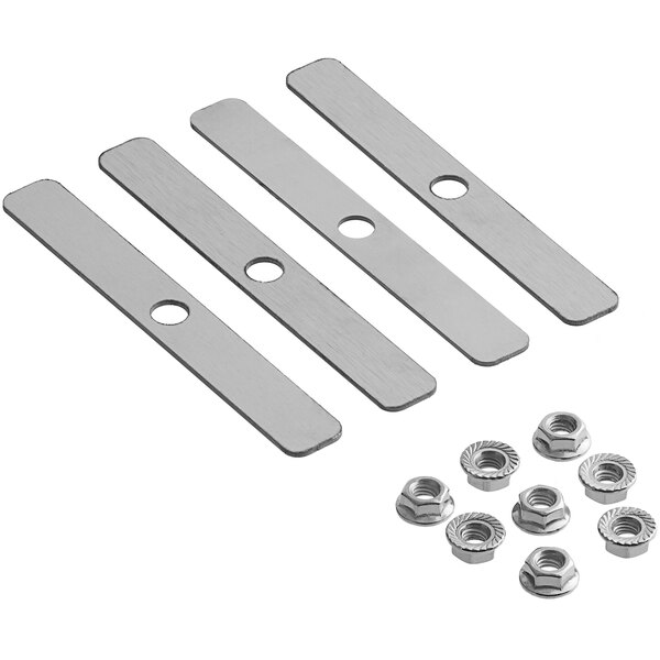 A group of stainless steel screws and nuts on metal plates.