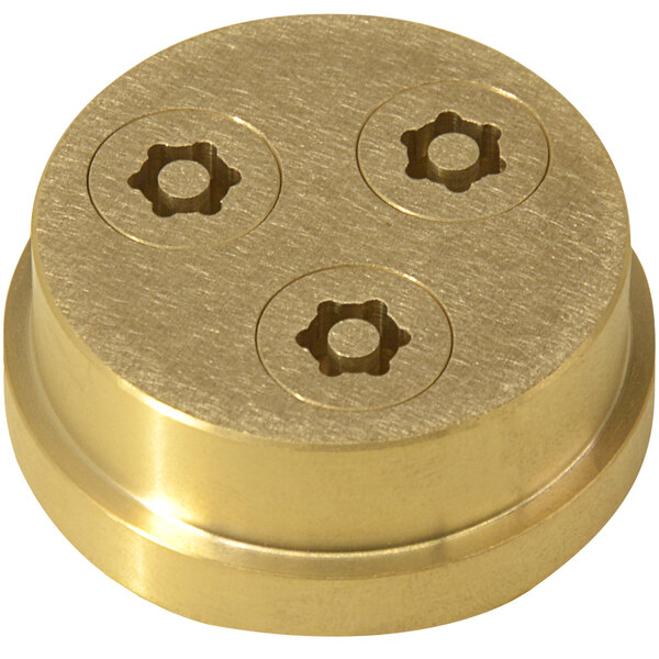 A gold metal Avancini Gargati pasta die with three holes in a circular object.