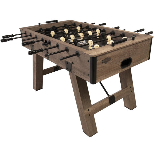 An American Legend Brookdale foosball table with black and white soccer balls.