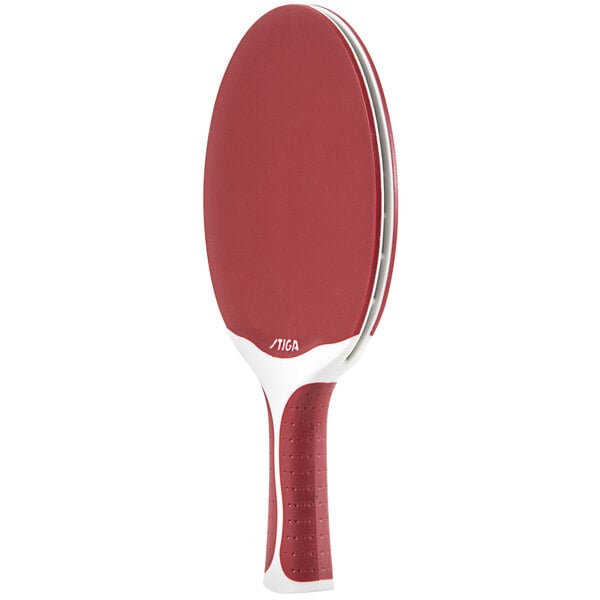 A red Stiga ping pong paddle with a white handle.