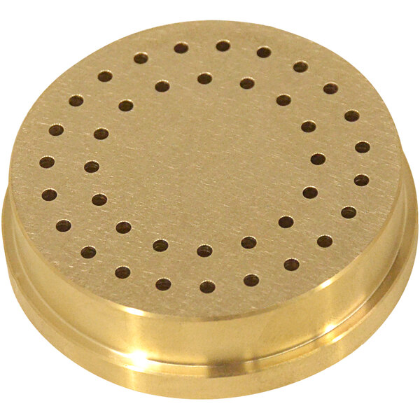A gold circular brass disc with holes.