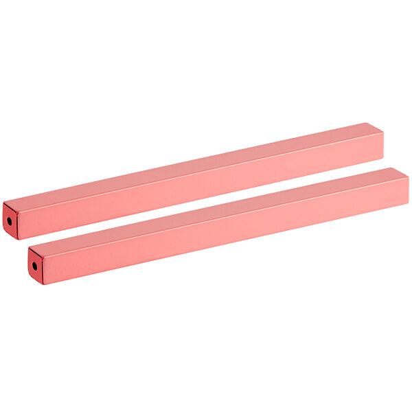 A pair of pink metal crossbars.