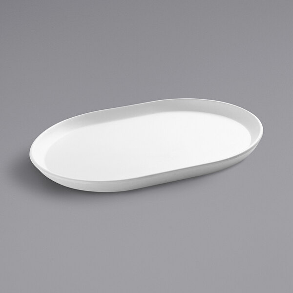 A white oval platter with a raised rim.