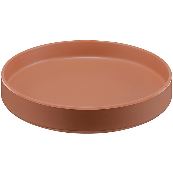 A brown round plate with a raised rim.