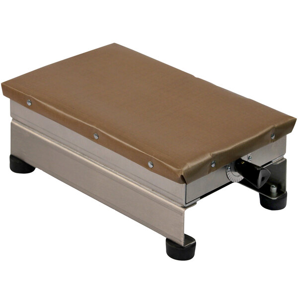A Heat Seal table top hot plate with a brown plastic cover on it.