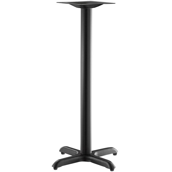 A black Lancaster Table & Seating Excalibur outdoor table base with a bar height column.