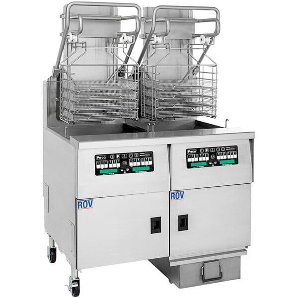 A Pitco Solstice natural gas rack floor fryer with baskets on wheels.