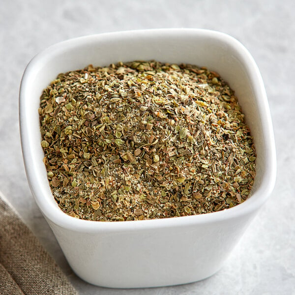 A bowl of Regal Pizza Seasoning spices.
