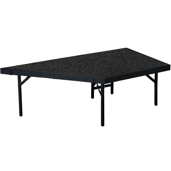 A National Public Seating black stage pie unit with legs.