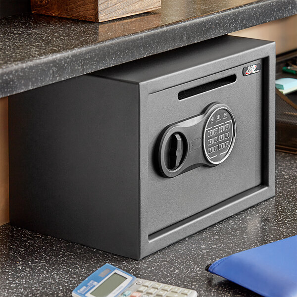 A black steel 360 Office Furniture depository safe with an electronic keypad lock.