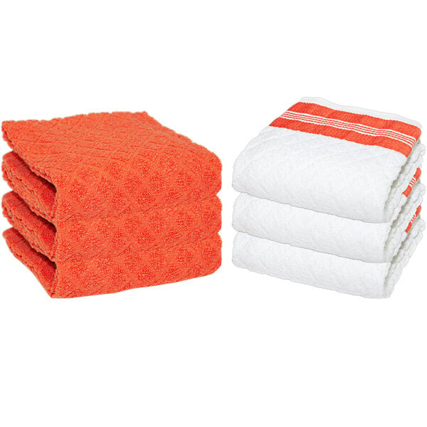A stack of orange and white Monarch Brands Premier Collection kitchen towels.