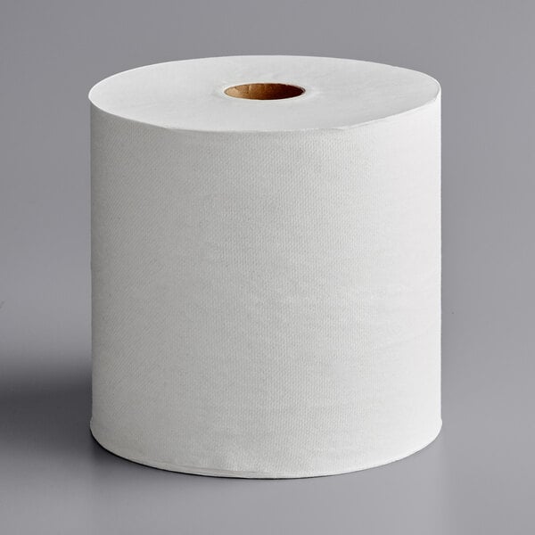 A white roll of Scott hard roll towel on a white surface.