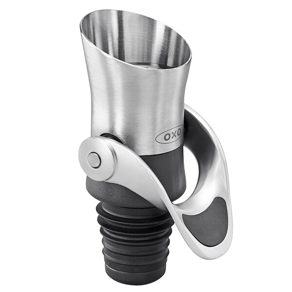 A silver stainless steel OXO wine pourer and stopper with a black handle.