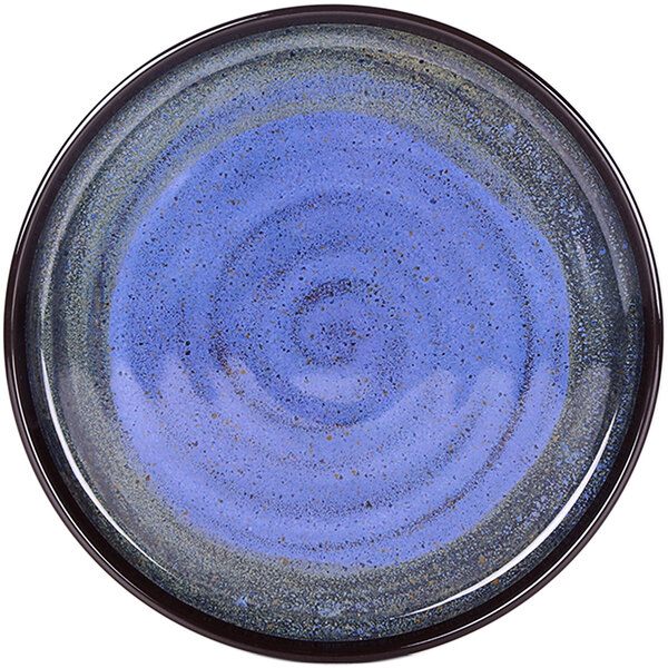 An Elite Global Solutions cobalt blue melamine plate with a raised rim and a swirl pattern.