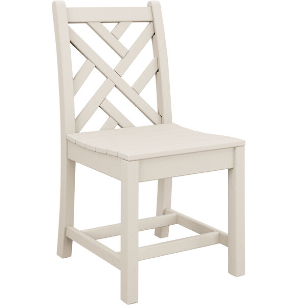 A white POLYWOOD Chippendale dining side chair with a wooden seat and cross back.