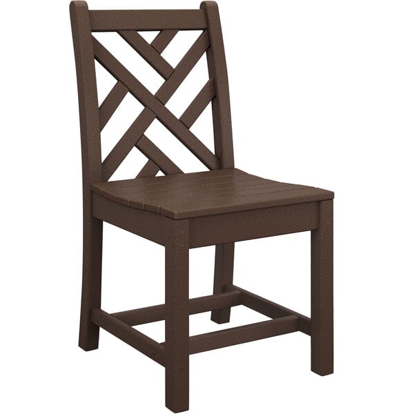 A brown POLYWOOD Chippendale dining side chair with a lattice patterned back.