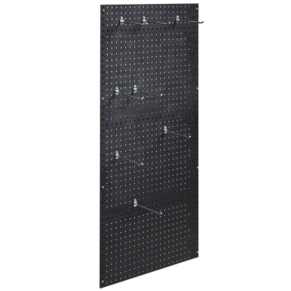 A black Cambro Camshelving pegboard with pegs.