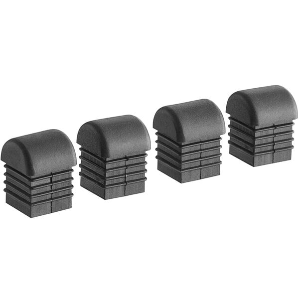 A black plastic box of four Lancaster Table & Seating Banquet Chair Replacement Glides.