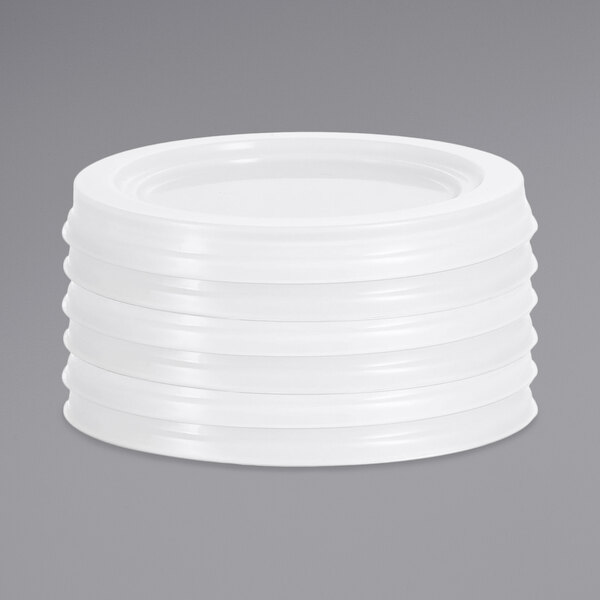 A white polyethylene lid on a white surface.