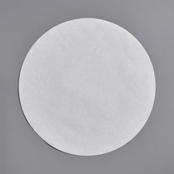 White circle disc-type filter paper.
