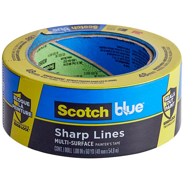 A roll of 3M Scotch Blue Sharp Lines Painter's Tape with a blue and yellow label.