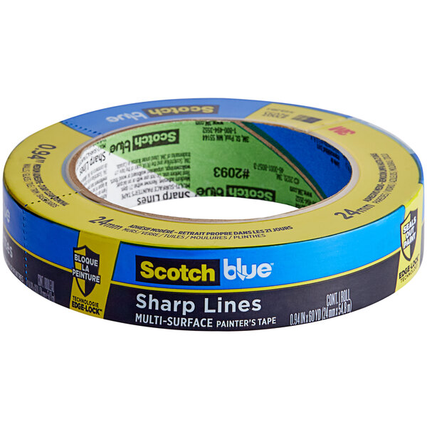A roll of 3M Scotch Blue Sharp Lines painter's tape with a blue and yellow label and text on it.