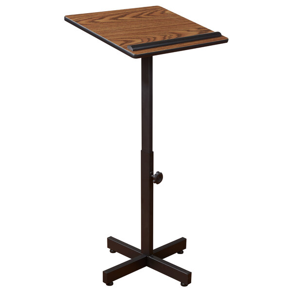 A wooden podium with a black base.
