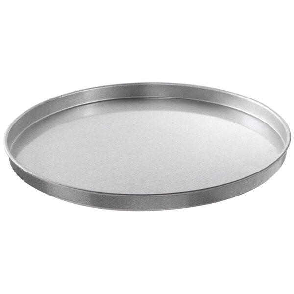 A round metal pan with a white background.