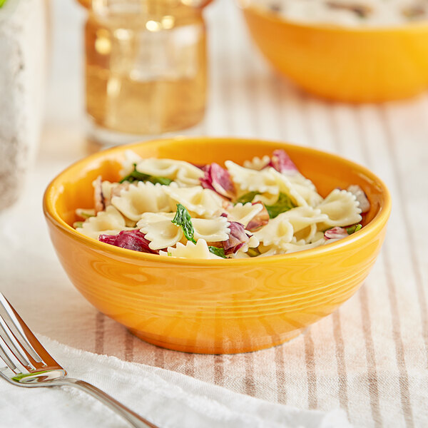 An Acopa Capri stoneware bowl filled with pasta and vegetables.