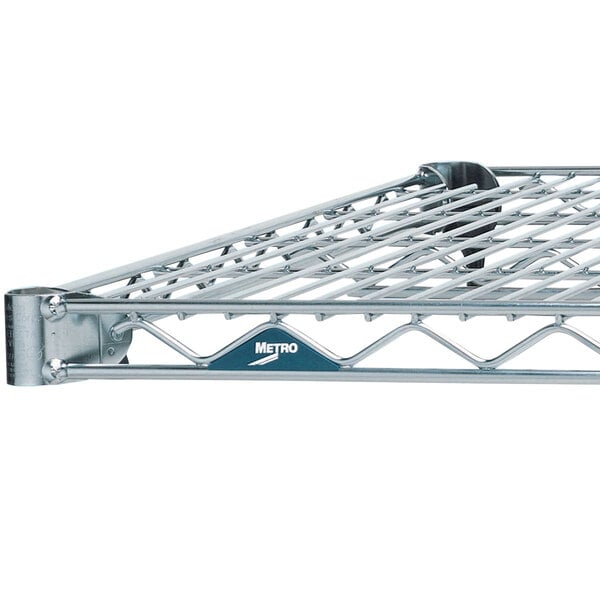 A Metro Super Erecta stainless steel wire shelf with a blue label.