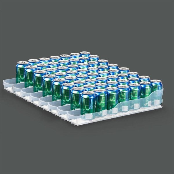 A Trueflex plastic tray with blue and green soda cans inside.